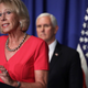 U.S. Secretary of Education Betsy DeVos speaks as Vice President Mike Pence listens during a White House Coronavirus Task Force press briefing at the U.S. Department of Education on July 8, 2020, in Washington, DC.